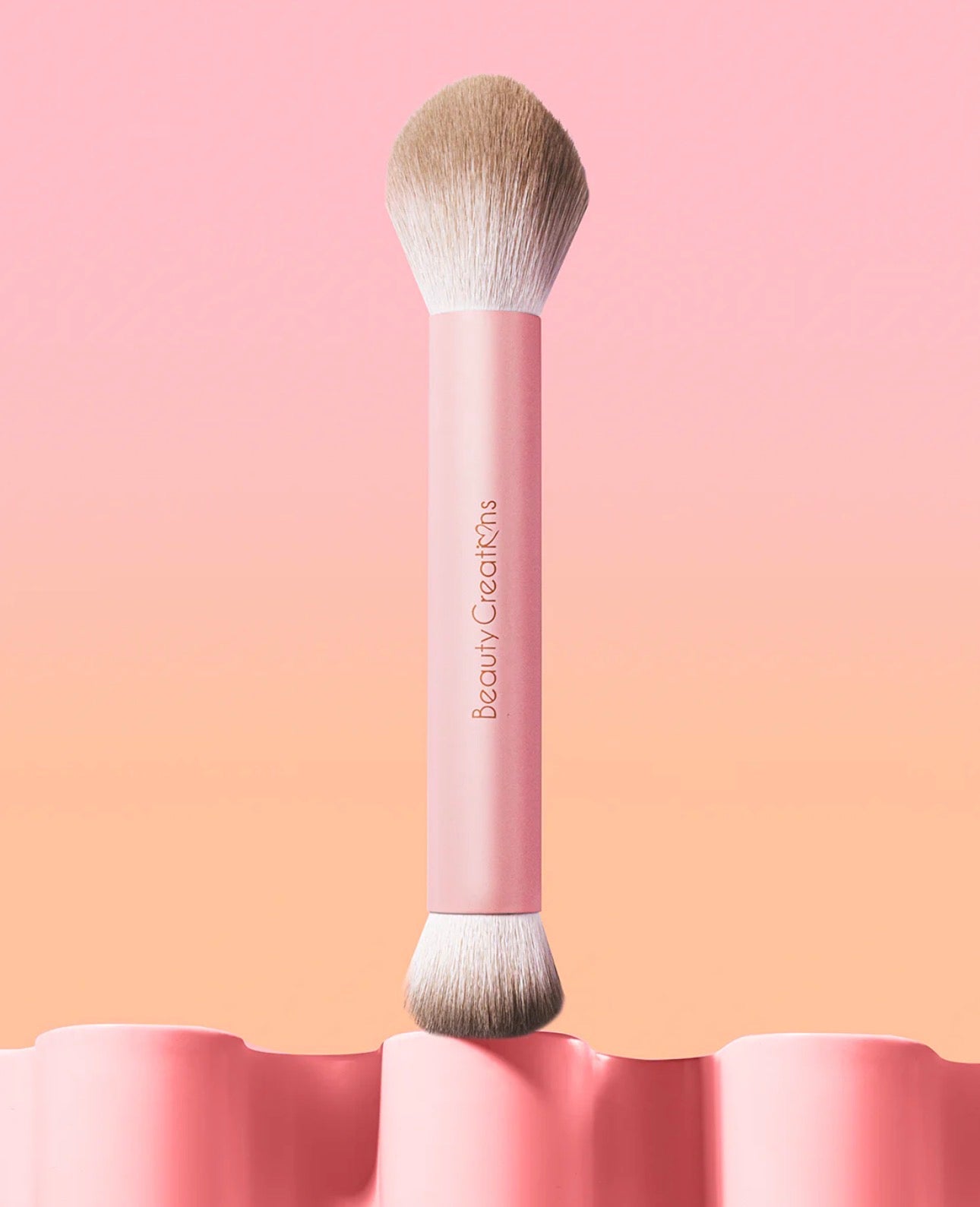 DUAL SIDED BLUSH BRUSH.